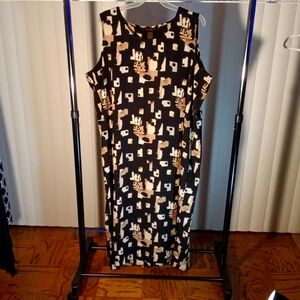 Black/Brown Sleeveless Dress w/Printed Designs.  Spit on side bottom dress. S24